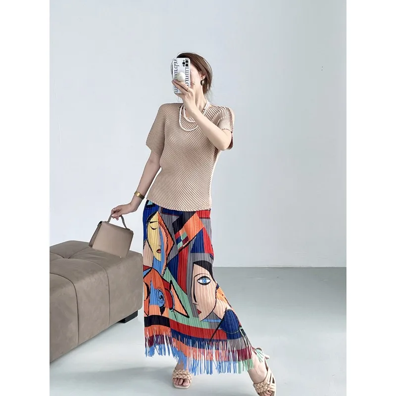 Pleated 2024 Summer Fashion Niche Design Retro Printed Half Skirt Bohemian Style Tassel Mid Length Half Skirt Women Clothing