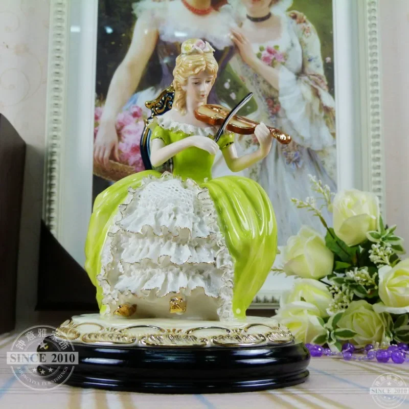 European ceramic character ornament, luxury living room, American western female cello, high-end art, home decoration