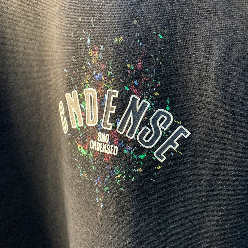 2025 ฤดูร้อนใหม่ Graffiti ทาสีหลวมแขนสั้นเสื้อยืดสําหรับชาย 2025 บางสบายๆพิมพ์ครึ่งแขนเสื้อผ้าผู้ชาย