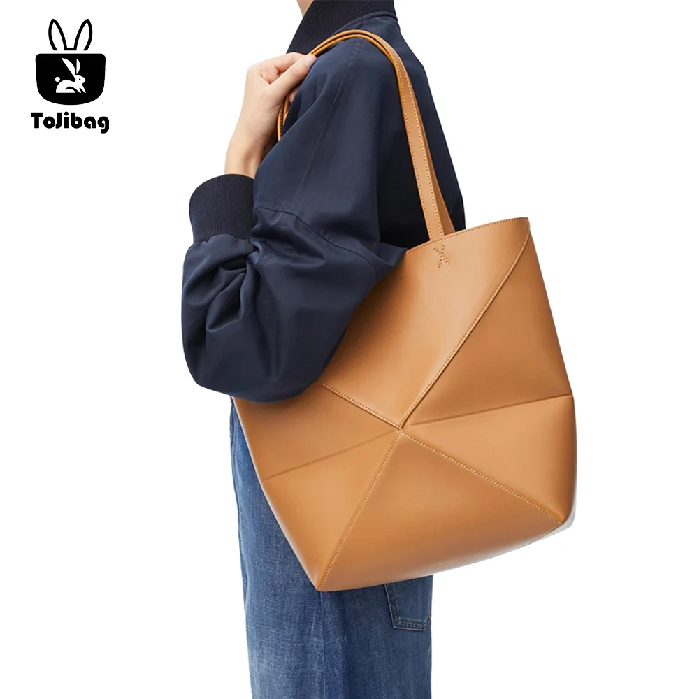 

2025 Deformed Geometric Large Capacity Tote Bag for Women Cowhide Niche Luxury Design Handbag Folding Underarm Shoulder Bags