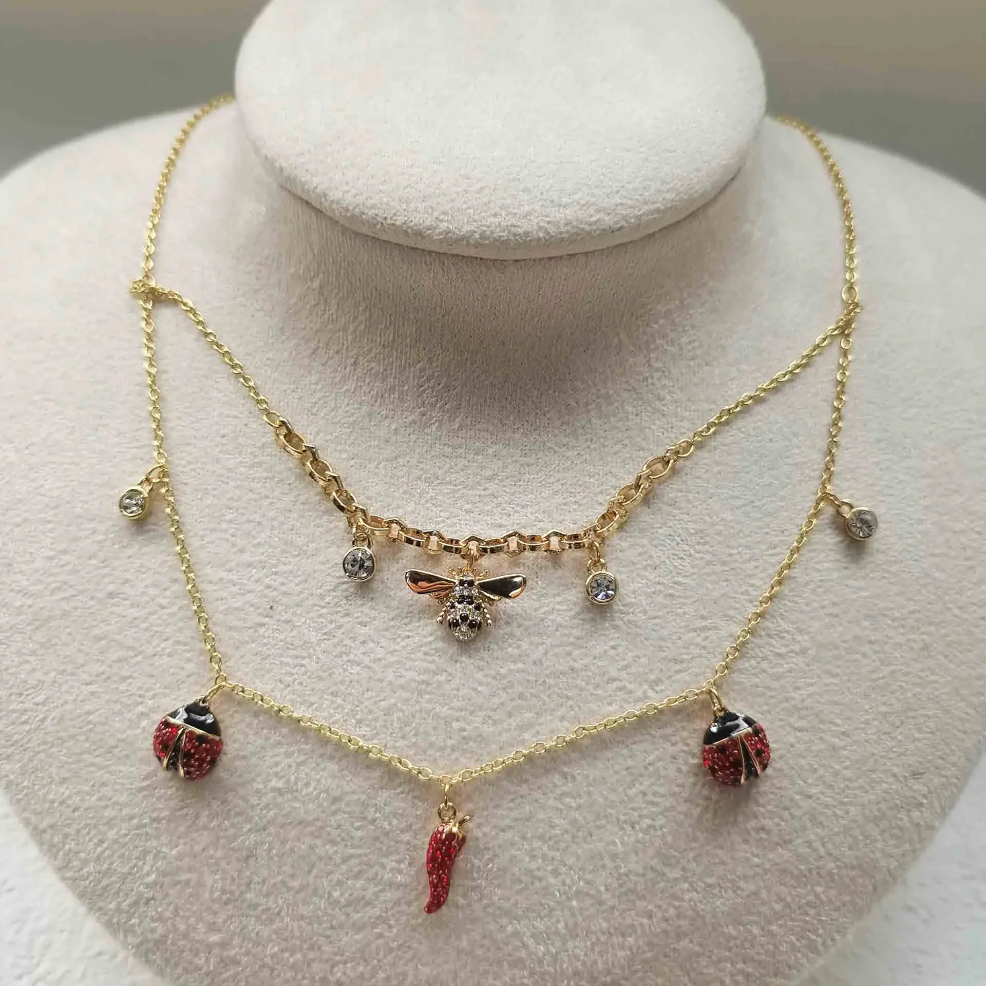 2026 Classic Fashion Perfect Crystal Inlay Craft Jewelry for Women Ladybug Bracelet Earrings Ring Chili Necklace Jewelry Set