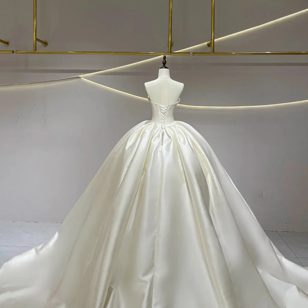 ชุดแต่งงานบอลกาวน์ผ้าซาตินสุดหรู แบบไร้สาย ประดับลูกปัด สไตล์เจ้าหญิง  สามารถสั่งตัดได้  ชุดเจ้าสาวแบบผูกเชือกด้านหลัง