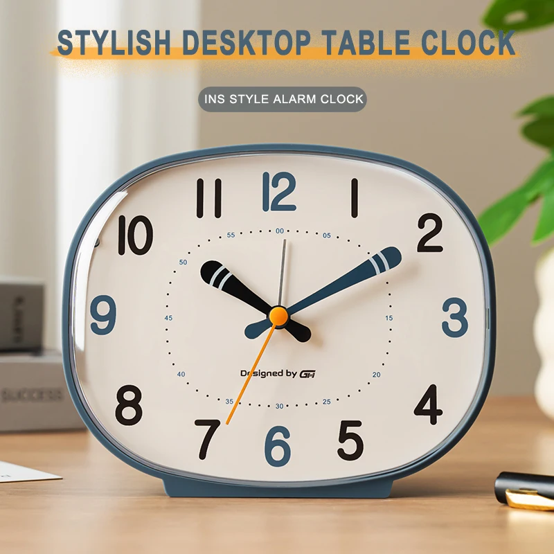 Creative, fashionable, sporty-style desk alarm clock with baseball-themed hands, silent operation and a simple night light funct