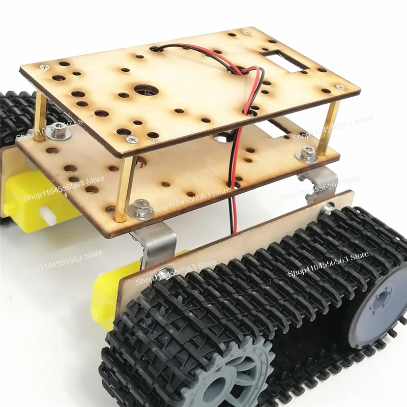 The metal/wooden double-layer crawling platform used for the mobile robot project, and the Arduino robot tank chassis