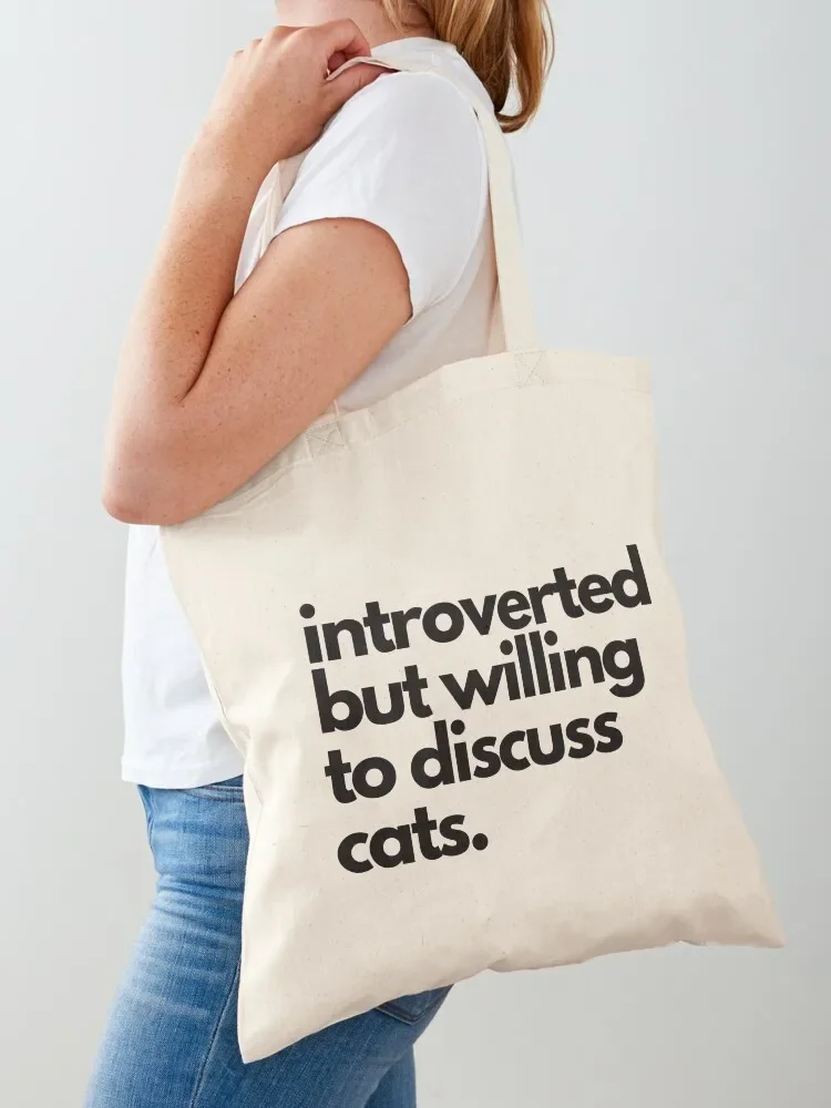 

introverted but willing to discuss cats. Tote Bag shopping trolley bag tote bag men tote woman Shopping bags
