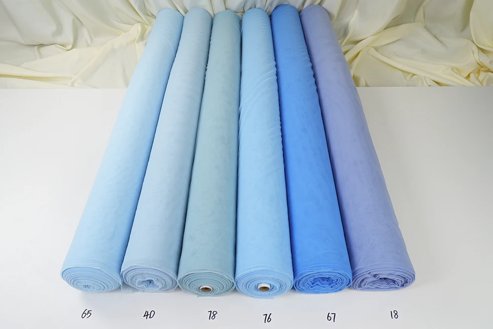 Light Blue Power Mesh Fabric is suitable for splicing dance costumes or figure skating outfits