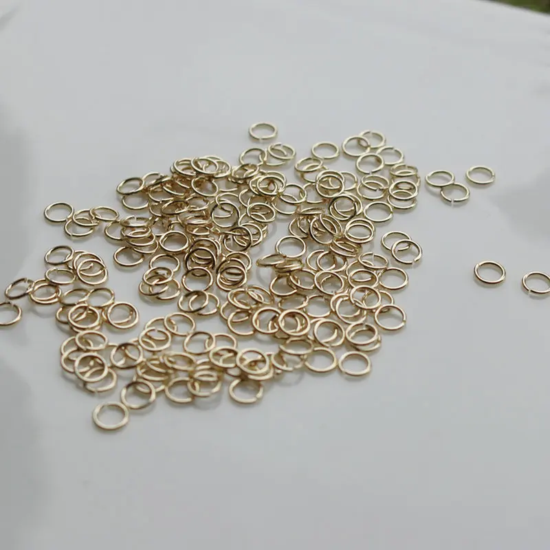 100 PZ All'ingrosso 14k Colore Oro Ottone Placcato 0.5mm 0.6mm 0.7mm Anelli di Salto Aperti per la Produzione di Gioielli Anello di Metallo Raccordi FAI DA TE