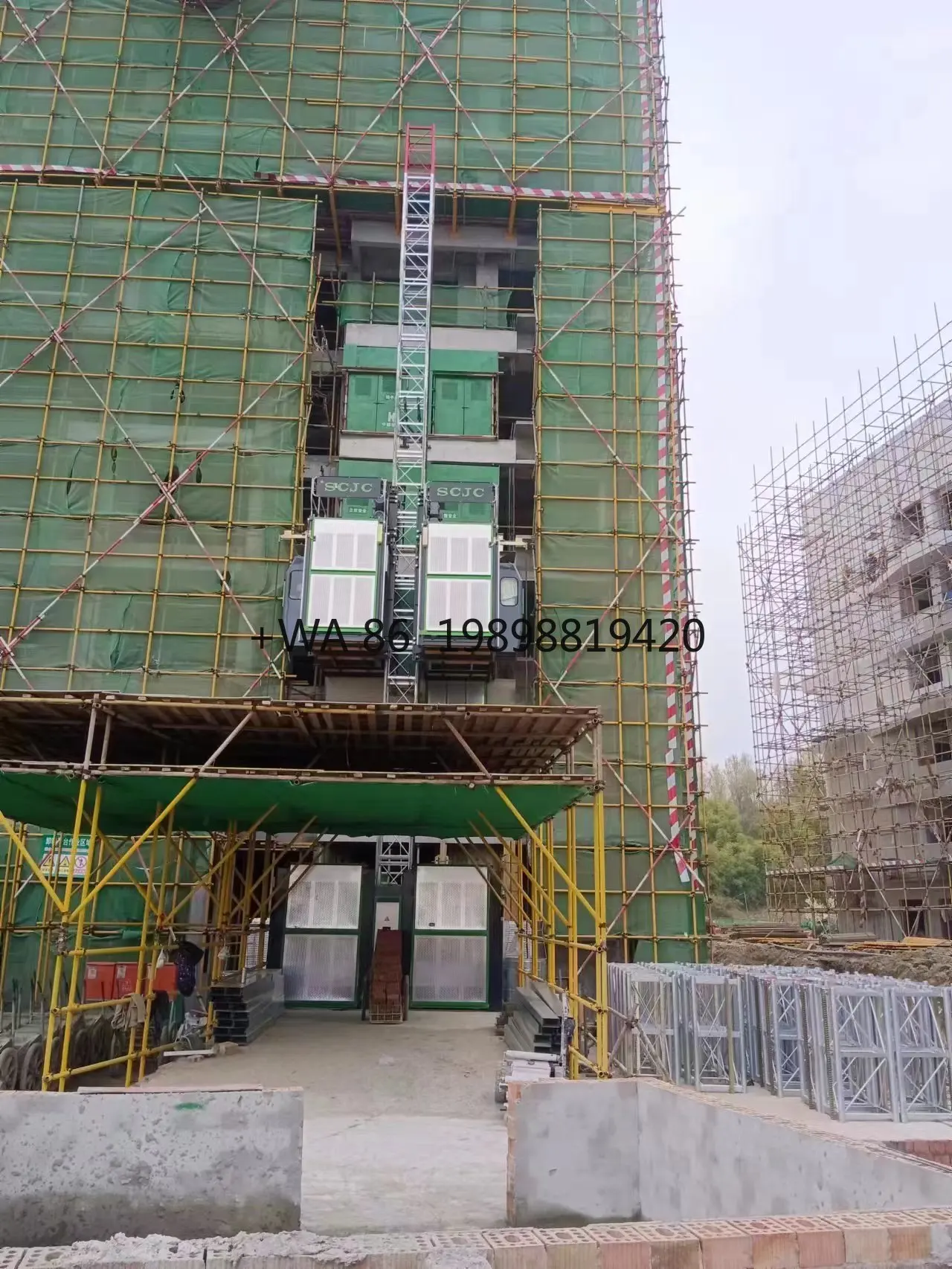 Construction Hoist 1.6 Ton Load Cost-Effective for Medium Projects Used Gearbox Construction Lifter 80m Energy Saving Electric