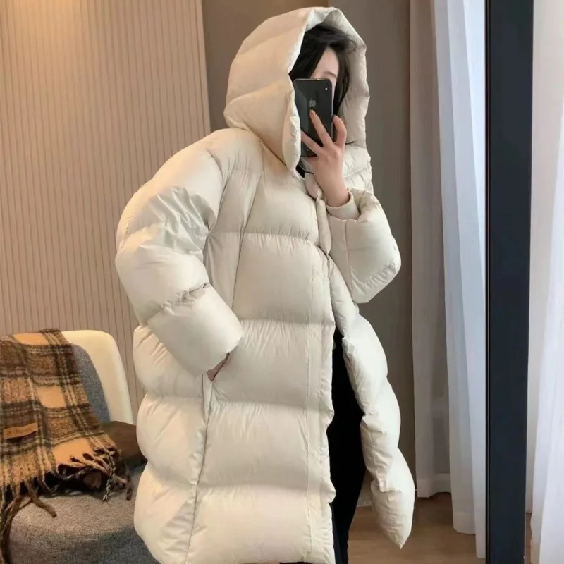 

High fluffy 90 white duck down mid length down jacket for women in winter 2025 fashion