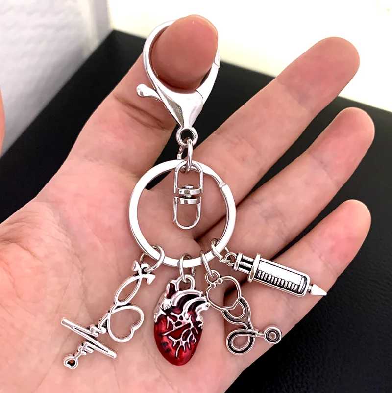 Llavero con colgante en forma de corazón con goteo de aceite, llavero de anatomía médica, llavero en forma de corazón, bolso de médico y enfermera, cadena, regalo de joyería