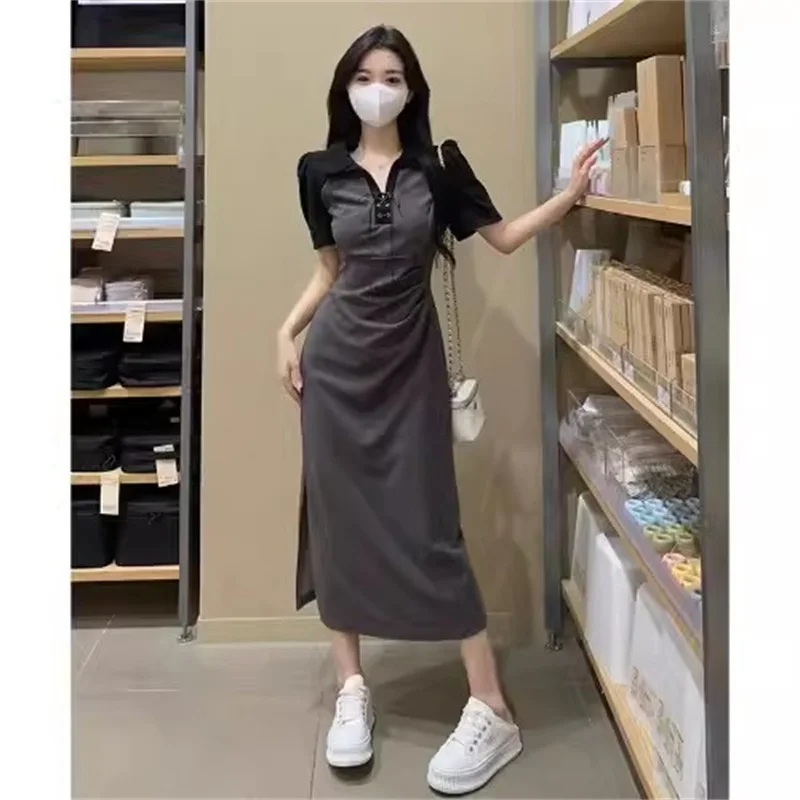 

Design sense Polo Neck Short Sleeved Dress for Women in Summer 2024Pleated Waist Slimming Effect Covering Flesh Split Long Skirt