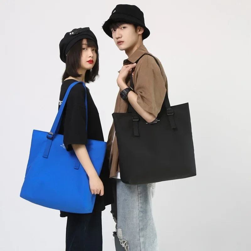 New simple Handbags Lightweight Wear-resistant Waterproof Large-capacity Commuting Simple Fashion Computer Student Shoulder Bags