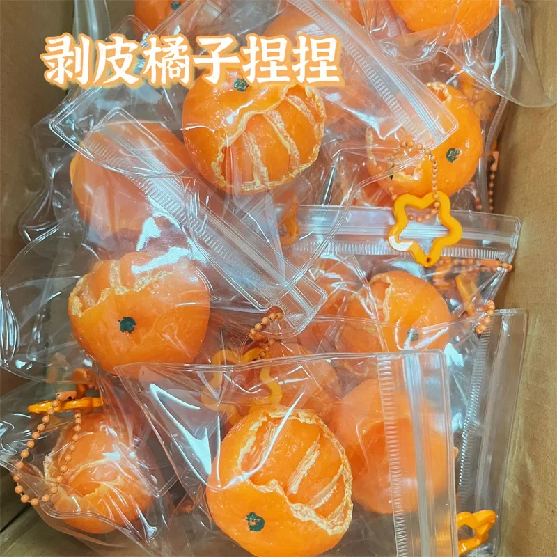 La misma versión de arcilla súper suave Douyin Orange Pinch, bola antiestrés adorable con forma de naranja, divertida y de rebote lento.
