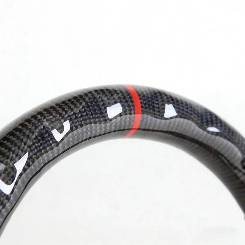 Image 7: Volant sport en fibre de carbone avec cuir perforé