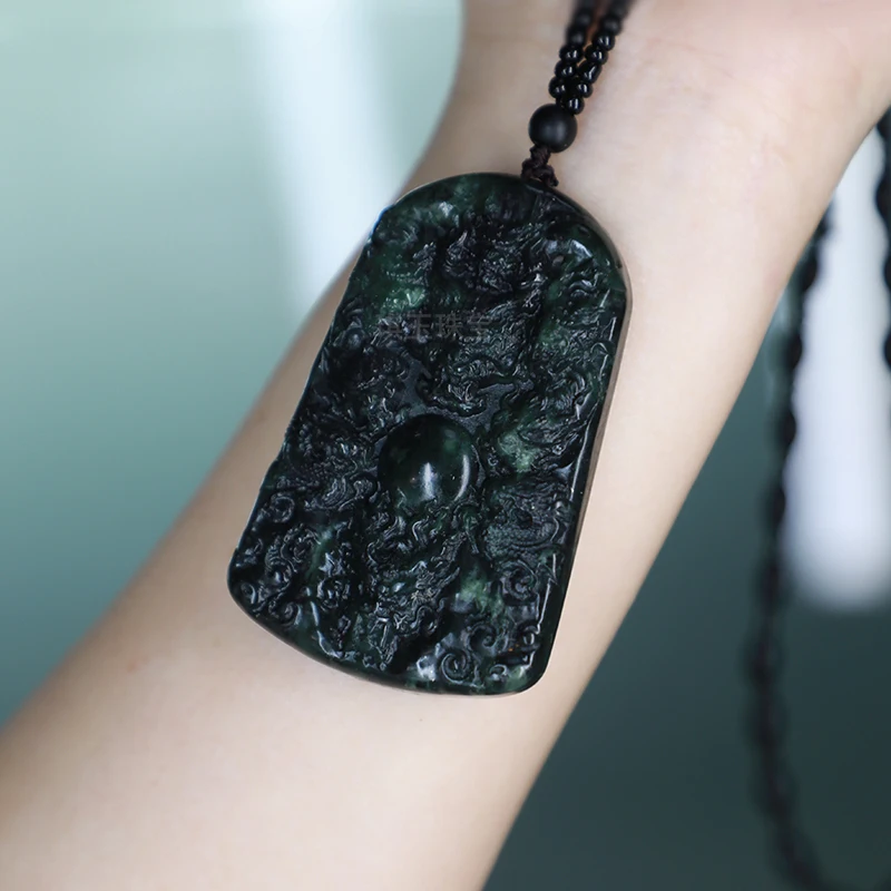 

Premium Retro Pendant for Ladies: Natural Dark Green Jade Dragon Plaque Pendant Symbolizing Protection