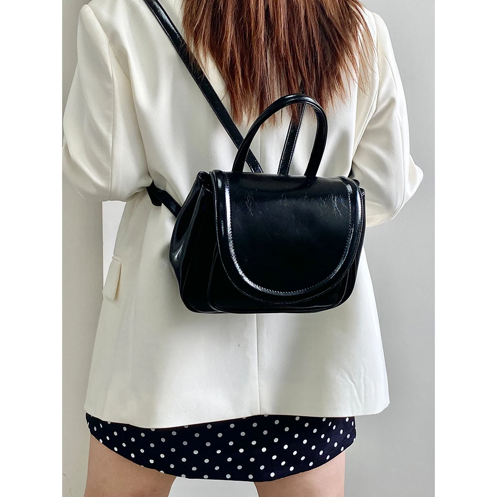 

Elegant Black Backpacks Women Solid Leather Flap Shoulder Pack Large Capacity Female Commute Handle Bags College Pu School Bag