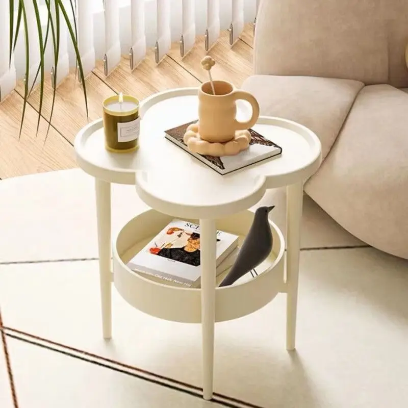 Simple modern cream wind four-leaf clover edge few creative flower-shaped bedside table household curved surface storage beds