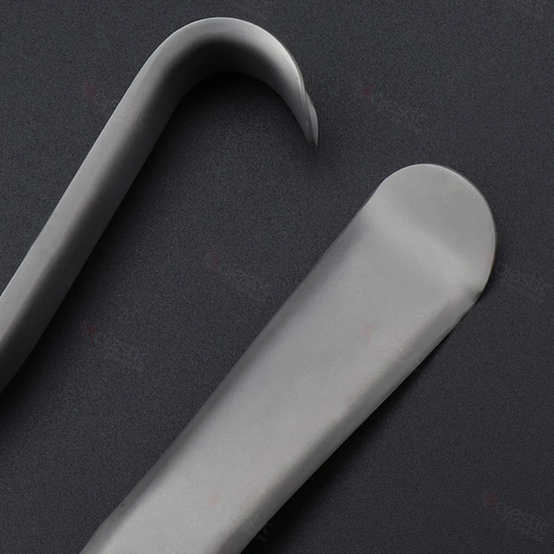 Material para instrumentos de enfermería, Retractor de ángulo para labio y mejilla