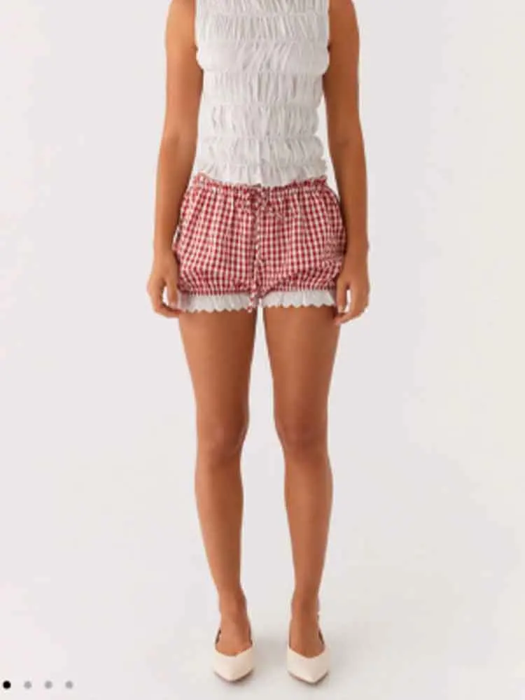 

European style new women's fashion versatile temperament bow decoration plaid stitching lace shorts