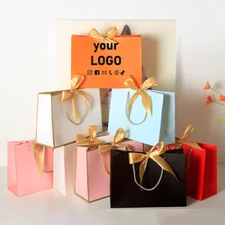 Minimum order of 10 bow paper gift bags, high quality clothing packaging bags, cosmetic bags, shopping tote bags, printed logo