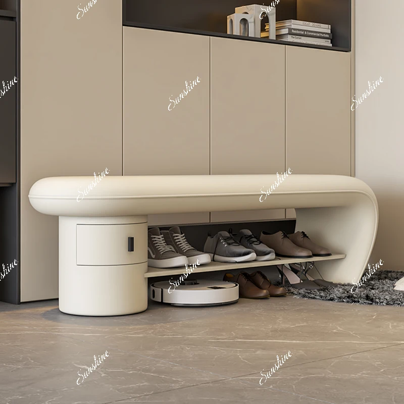 Small apartment at door of  home can sit on a sofa stool and enter door for storage, and enter the shoe cabinet.