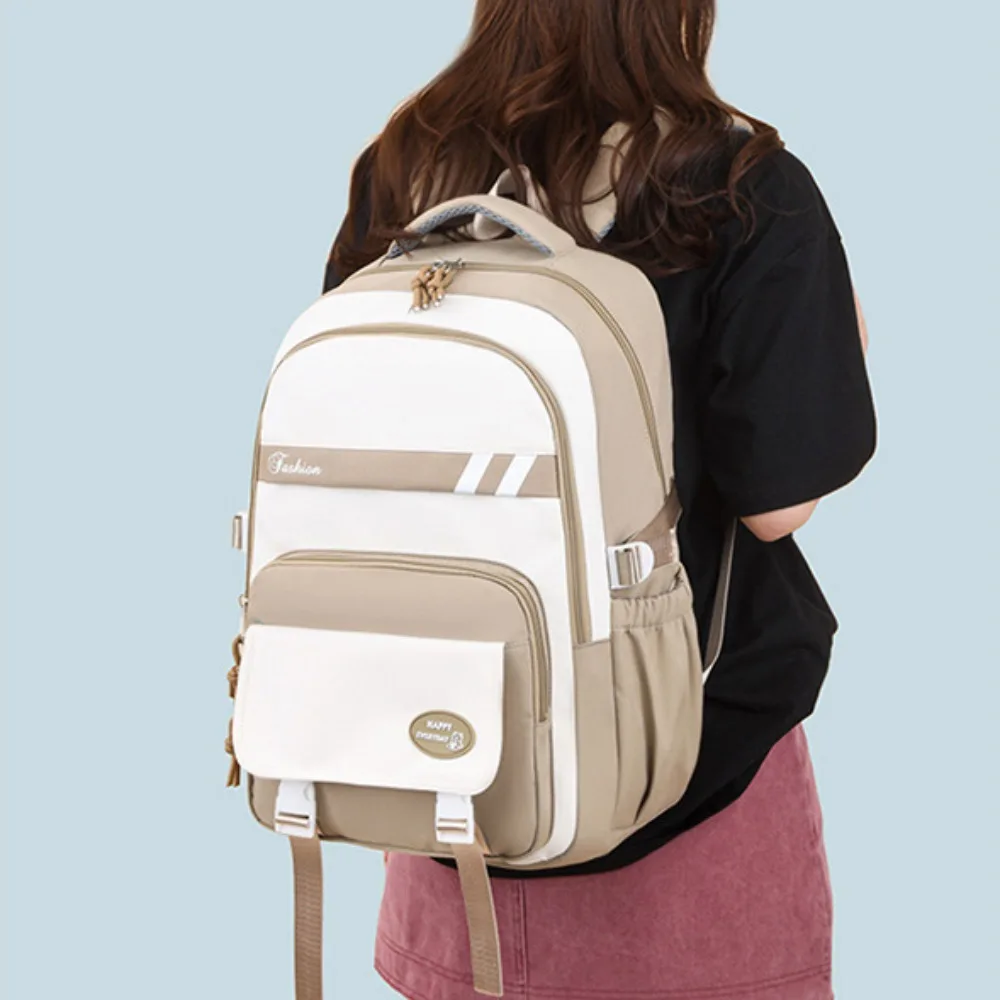 กันน้ําเด็กโรงเรียนกระเป๋าเป้สะพายหลังไนลอนความจุขนาดใหญ่นักเรียนกระเป๋านักเรียนน้ําหนักเบากระเป๋าเป้สะพายหลังโรงเรียนประถมศึกษาชายหญิง