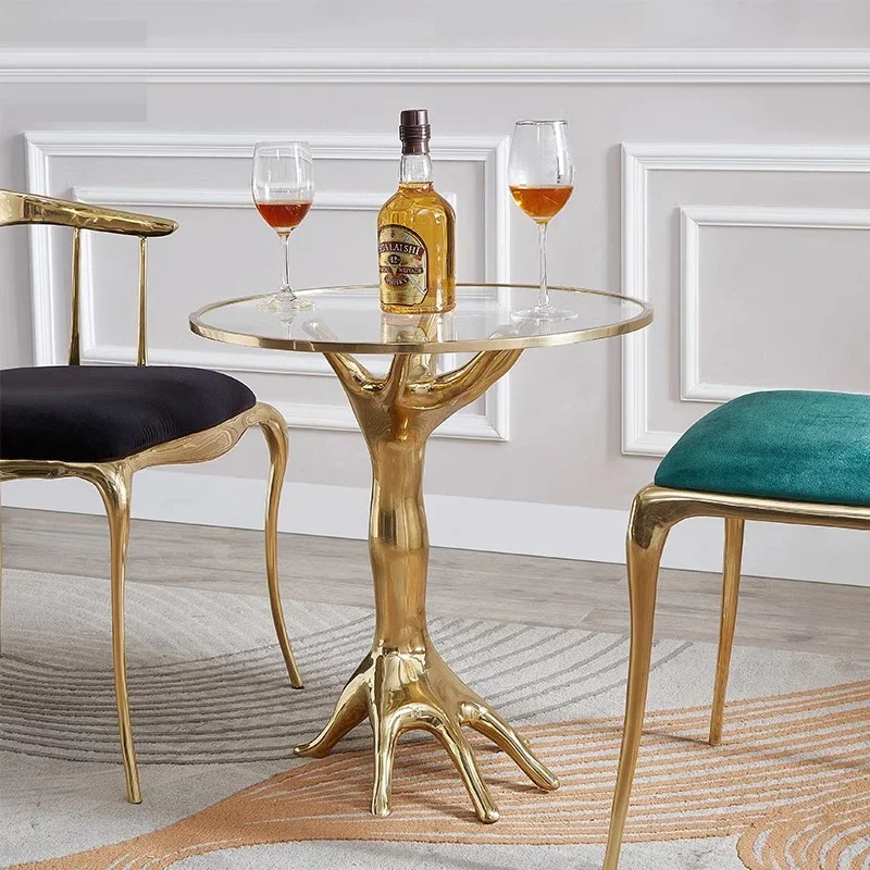 

z Unique Nordic Glass Top Hand-designed Table with Gold Base and Glass Side Table