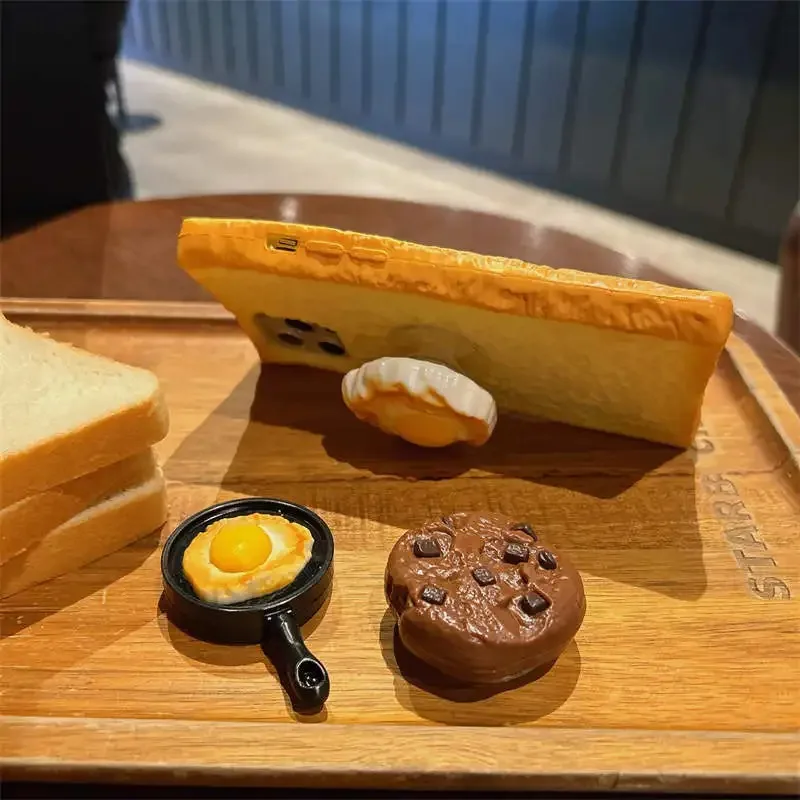 

Case for IPhone 15 Pro Egg Folding Bracket Bread Soft Silicone Cover for IPhone 16 Pro Max 3D Simulation Toast Phone
