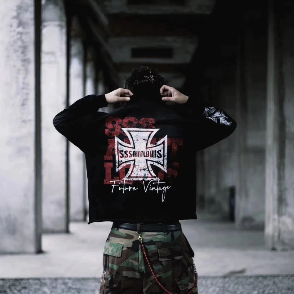 

Sssaint Louis creates a dirty aged and damaged long-sleeved graffiti cross-stripe shirt