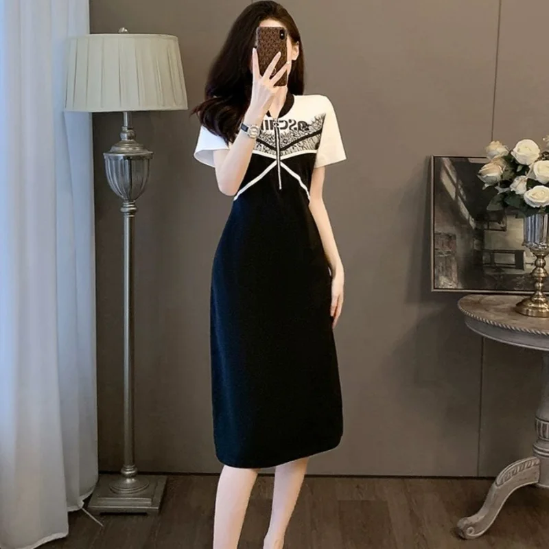 Estate nuovo temperamento elegante moda stampato impiombato cerniera pendolare Versatile scollo a v manica corta a-line abito di media lunghezza