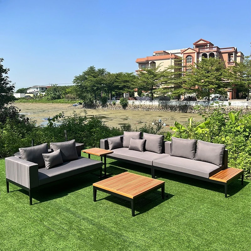 

Leisure simple outdoor sofa outdoor garden courtyard homestay waterproof and sunscreen lying bed solid wood coffee table