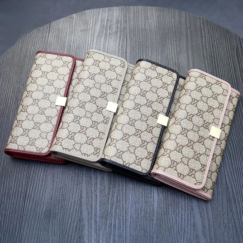 nouveau-portefeuille-long-en-cuir-grande-capacite-en-cuir-de-vachette-avec-pince-a-billets-multifonction-sac-a-main-tendance-hong-kong-2026