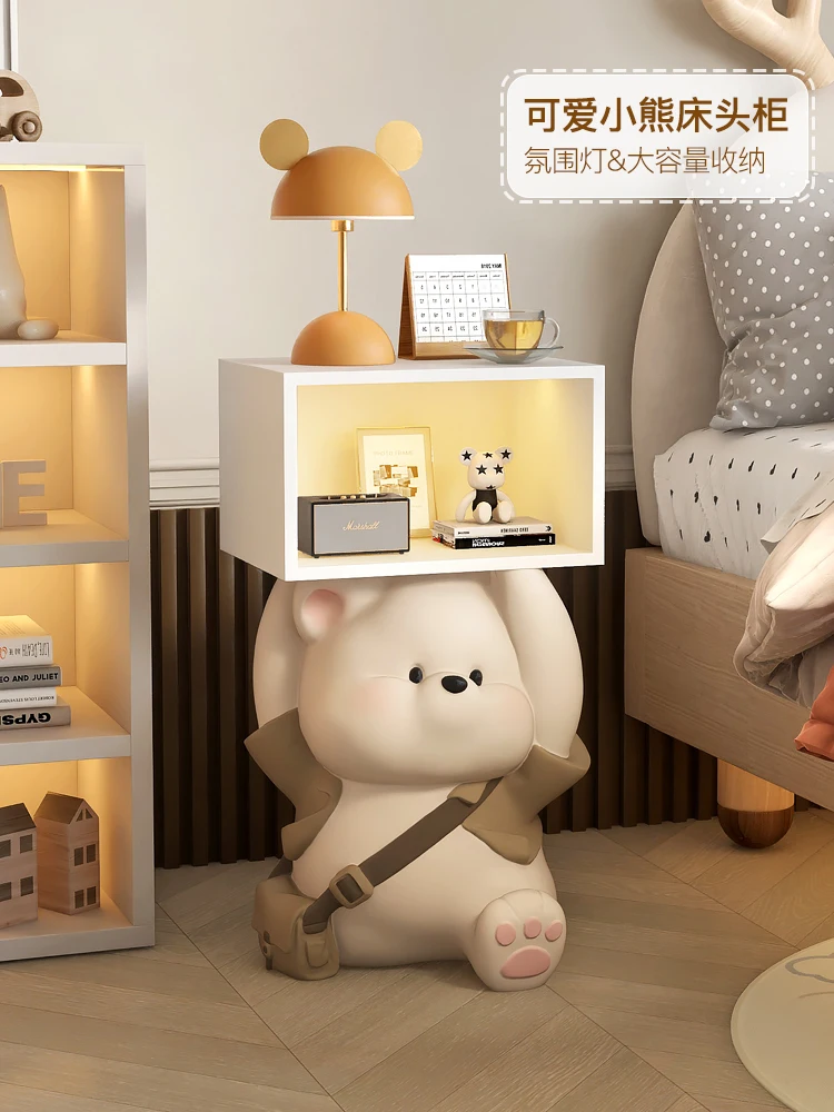 Cream wind bear children's bedroom bedside table living room sofa next to a few floor storage ornaments home decorations.