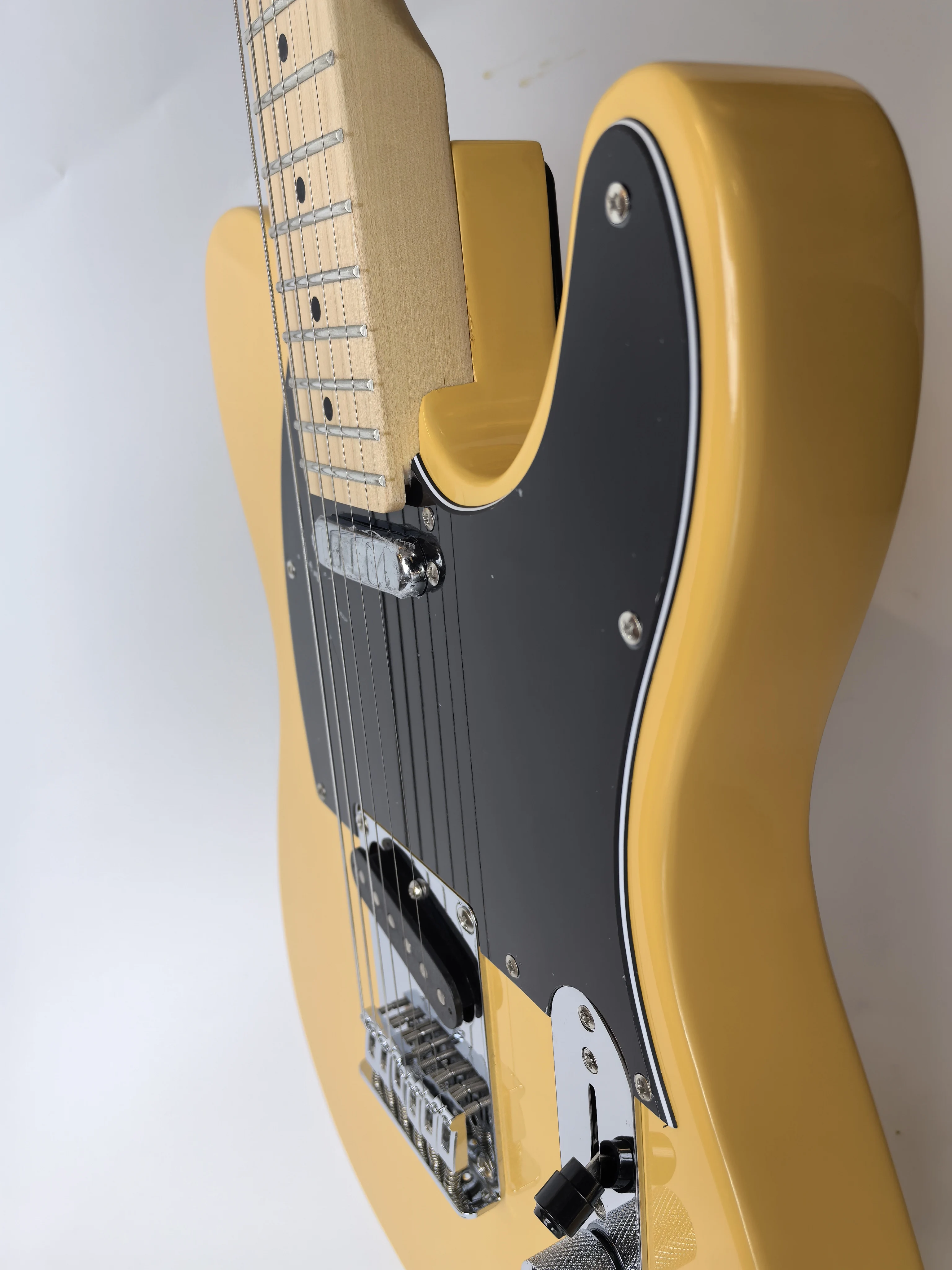 Ventas directas de fábrica, el color se puede personalizar, guitarra eléctrica de madera de sycamore de 6 cuerdas, estructura simple y generosa, orden de deli