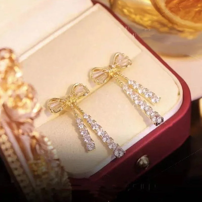 Koreański trend musujące cyrkonie Bowknot długie kolczyki z frędzlami dla kobiet elegancki kryształowy kwiat motyl wiszący kolczyk biżuteria — zdjęcie 7