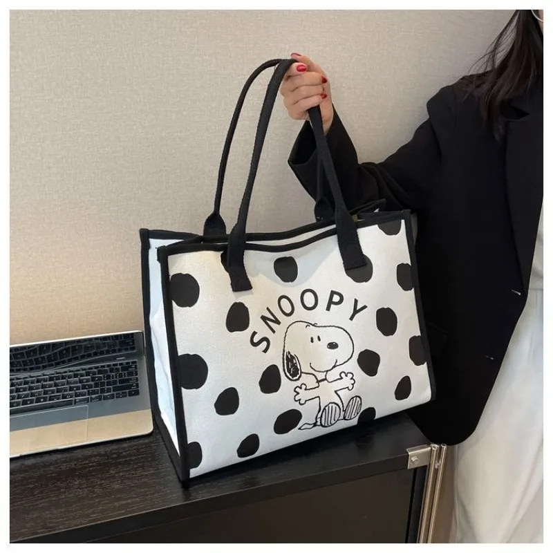 Ms. Snoopy\'s new fashionable and personalized cartoon print simple and versatile large-capacity one-shoulder portable canvas bag