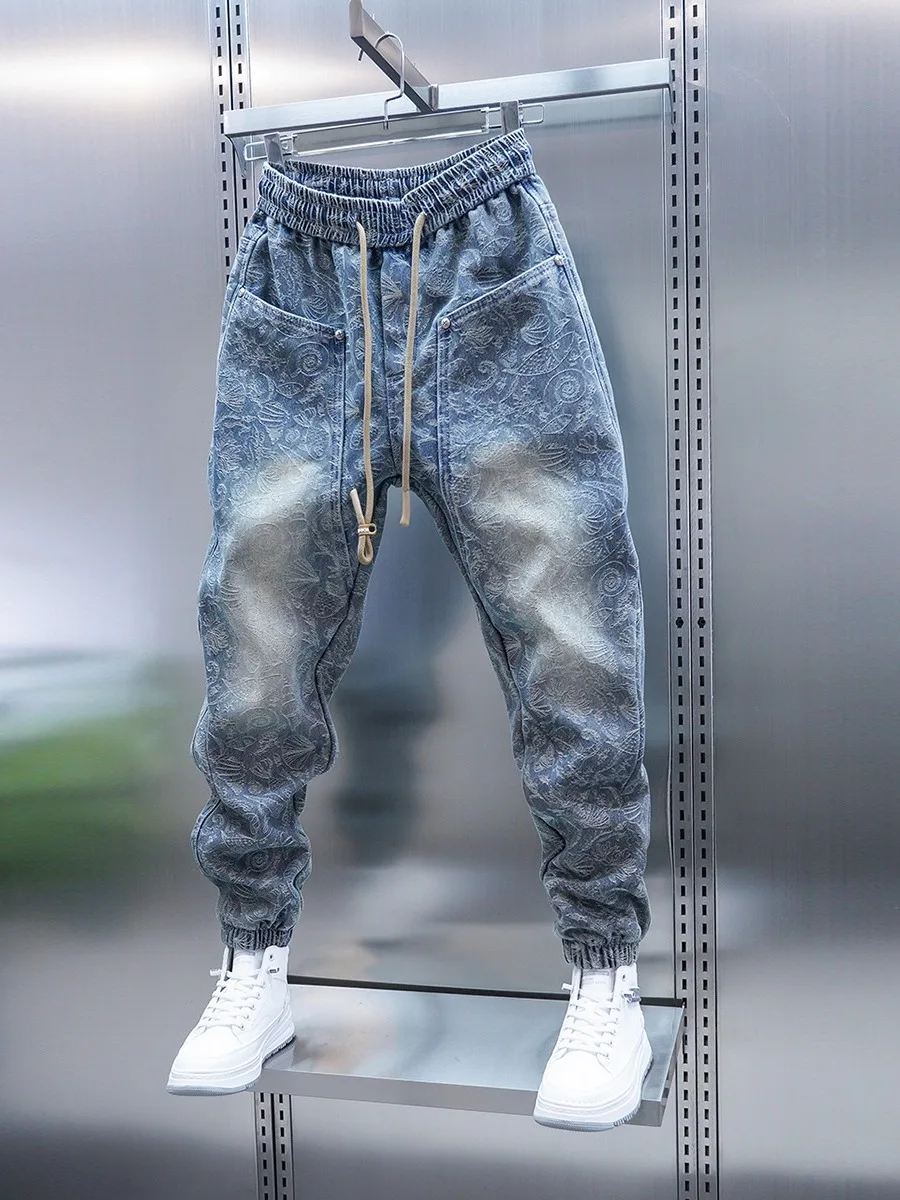 

Светло-голубые мужские модные осенние джинсы с вышивкой, с отворотами, на шнурке, узкие джинсы-харлан, молодежный тренд
