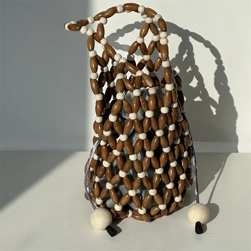 

Handcrafted Beaded Wooden-Bead Bucket Bag Vintage Hollow out Design Versatile Shoulder Bag for Women Cross-Border Trend