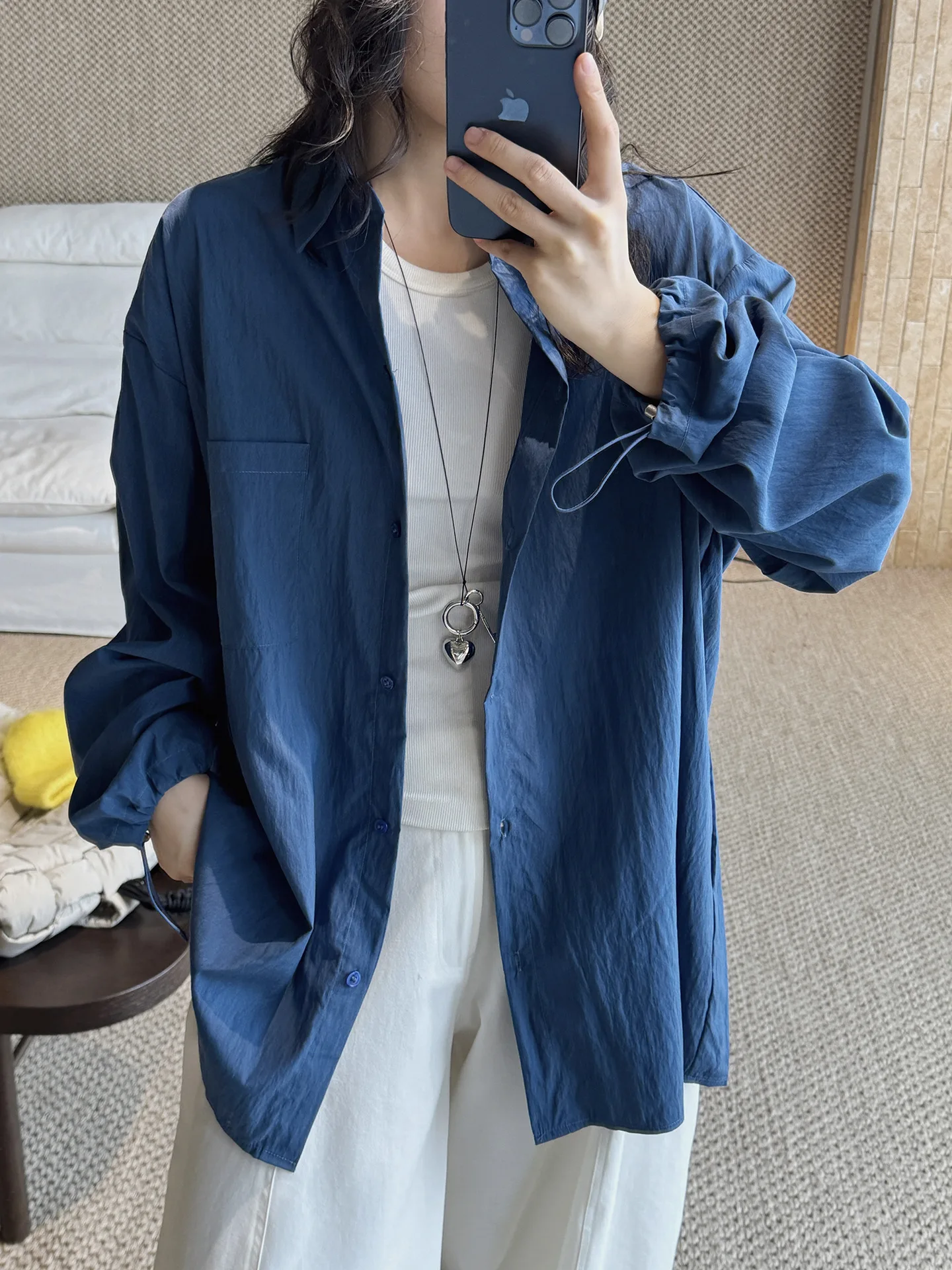Early spring simple and fashionable lapel drawstring long sleeved shirt with loose silhouette and comfortable top for women