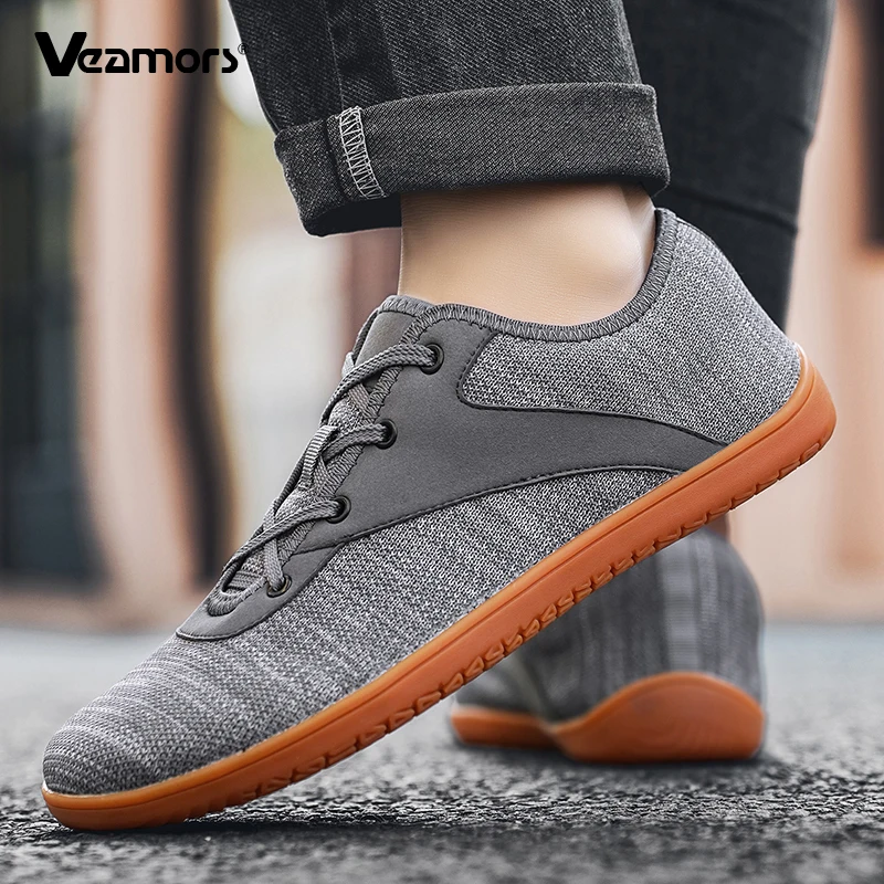 รองเท้าผ้าใบตาข่ายระบายอากาศ รองเท้าลำลองหัวกว้าง รองเท้ากีฬาครอสเทรนนิ่งสำหรับผู้หญิง รองเท้ากันลื่นสำหรับผู้ชาย รองเท้าเดินเล่นกลางแจ้งแบบแบน