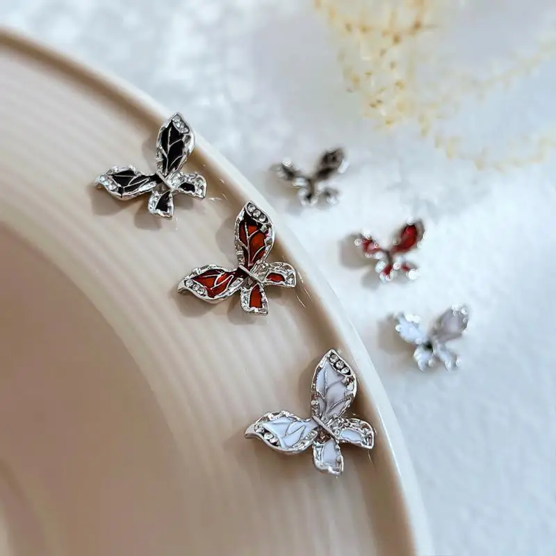 ทำเล็บสามมิติอุปกรณ์ตกแต่งเล็บโลหะผสมสีเครื่องประดับโลหะผสมผีเสื้อเครื่องประดับเล็บที่กรอเล็บใหม่