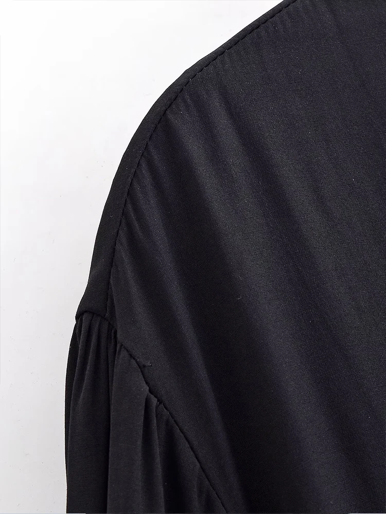 European style new women's fashion versatile elegant solid color long-sleeved shirt with bow detail and round neckline.