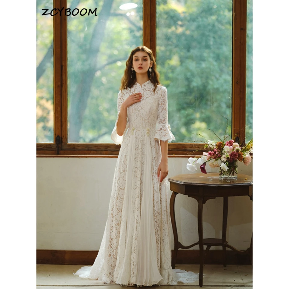 

Vintage Ivory Open Back High-neck Lace Wedding Dress 2023 Floor Length Sweep Train A-Line Pearls Three Quarter Bridal Gown