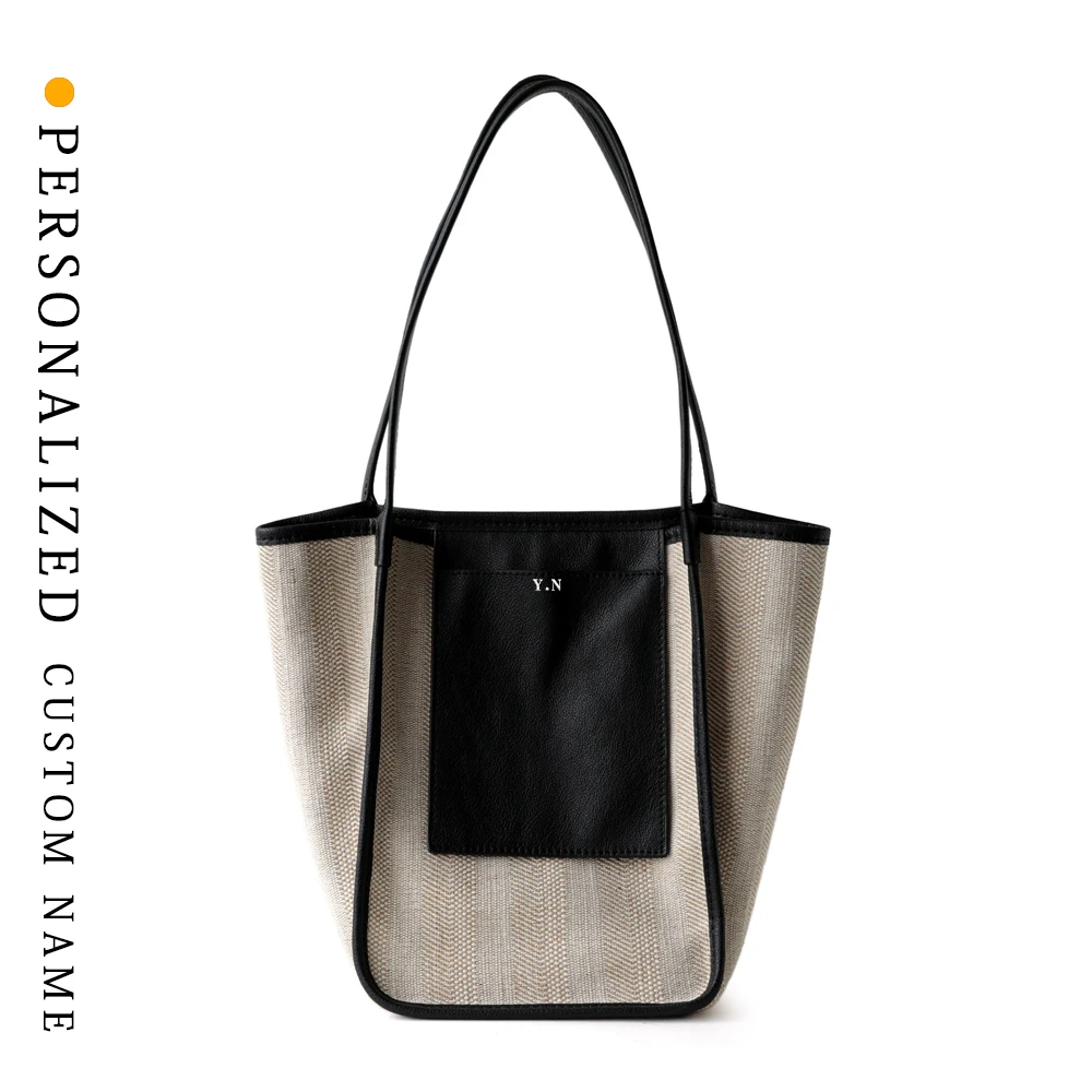 

Niche design simple large capacity cotton and linen single-shoulder bucket bag with first layer cowhide commuter tote bag