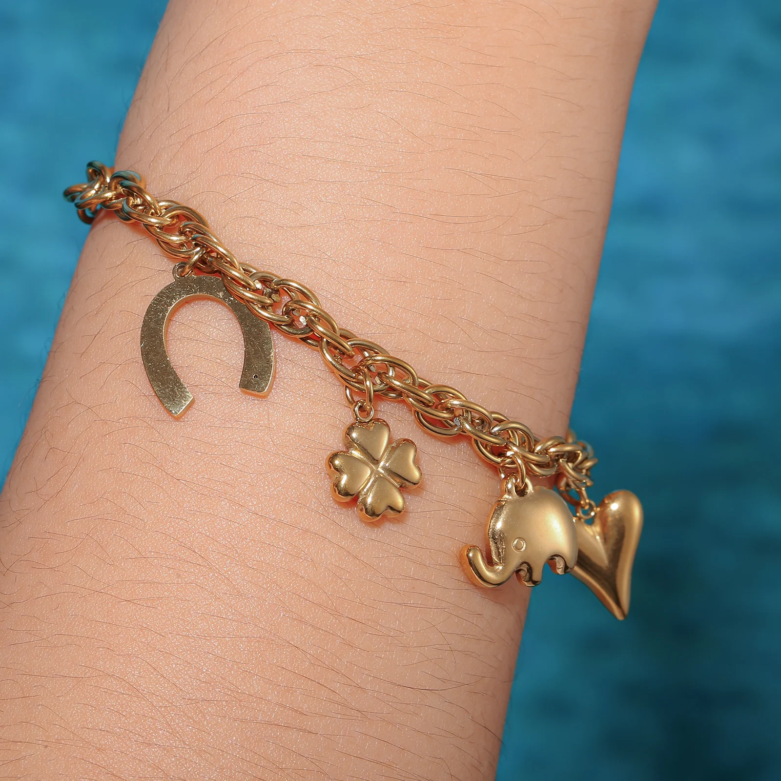Golden Tone Stainless Steel Cuban Chain Charm Bracelet with Elephant Clover and Heart Pendants for Women