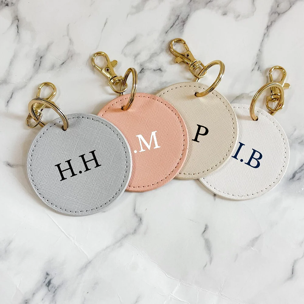 

Customized bag letter pendants can hang keys, round leather bag accessories keychain key ring car keychain bag charm