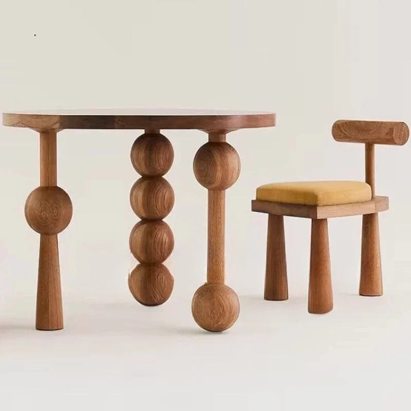 Modern simple all-solid wood round dining table, home retro hotel creative irregular carved ash wood table