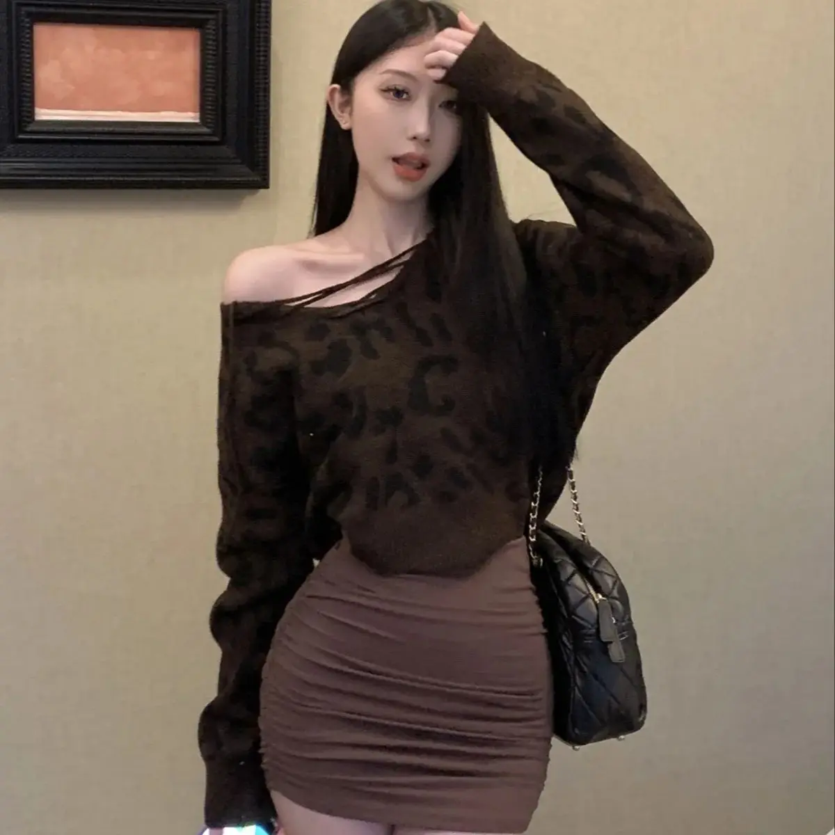 Autumn and winter fashionable and personalized leopard print cocoa string design soft waxy sweater + hip-covering slim skirt sui