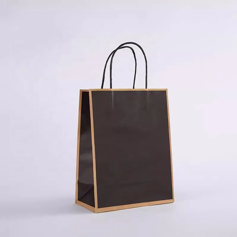 Custom..pieces.Whosale clothing paper bag customised logo/name paper bag paper bag with handle rope