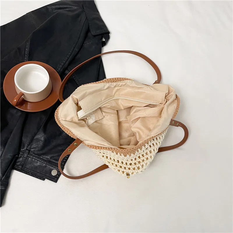 Estate 2025 Nuovo marchio di lusso Fashion Design Borsa tote da vacanza in paglia intrecciata di alta qualità Borsa da donna a spalla singola